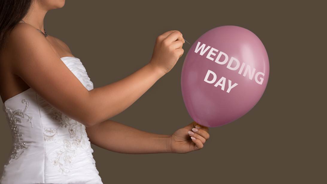 A person in a white dress holding a pink balloon

AI-generated content may be incorrect.
